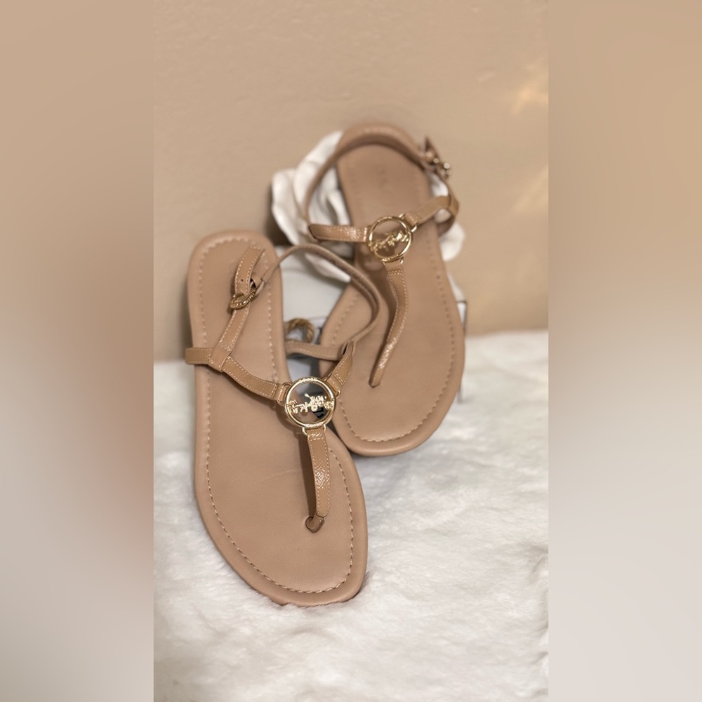 Coach Women’s Tan T-Strap Sandals with Gold Logo Medallion